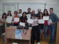 The organizers getting well earned diplomas